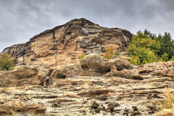 Beautiful mountain landscape with ancient rock monastery