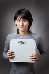 model holding scales