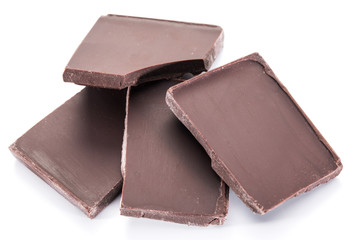 Pieces of chocolate bar isolated on a white background.