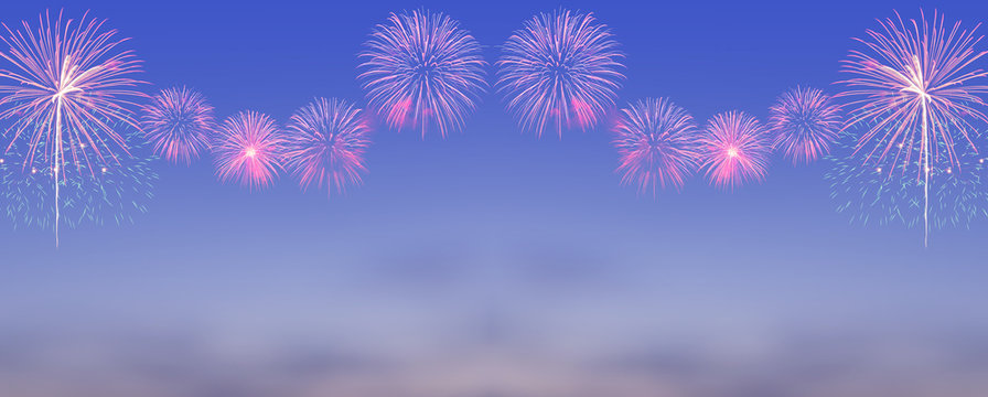 Fireworks on blurred twilight sky background