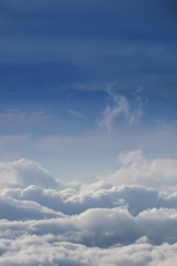 Fototapeta na wymiar Cloud texture wallpaper. View of blue sky and cloudy field from