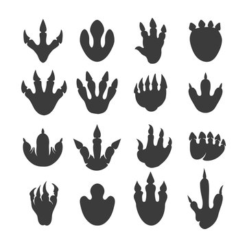 Vector reptile footprints. Dinosaur tracks vector black icons