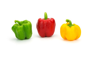 Fresh sweet peppers isolated on white background
