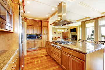 Modern wooden kitchen room design with hardwood floor, island, g