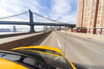 New York City Yellow Taxi Cab by Manhattan Bridge