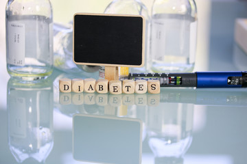 Diabetes Pen mit Tafel und Hinweis