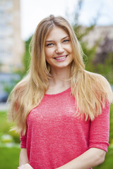 Portrait close up of young beautiful blonde woman