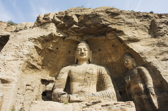 Buddhist statues of Yungang Caves cut during the Northern Wei Dynasty in 460 AD near Datong, Shanxi province, China