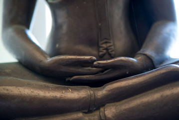 The hands of a Buddha statue in meditation - 113299872