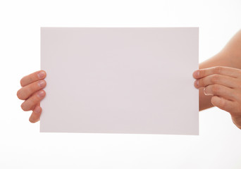 Fototapeta premium Unrecognizable man holding an empty sheet of paper