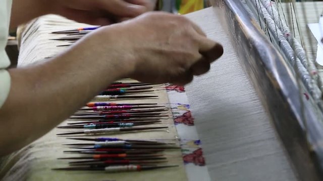Indian local man makes a Pashmina Shawl the traditional way in Srinagar, Kashmir province. India