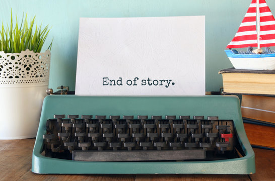 photo of vintage typewriter with phrase: END OF STORY