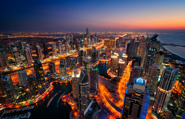 Naklejka premium Colorful sunset. Dubai marina skyline, United Arab Emirates.