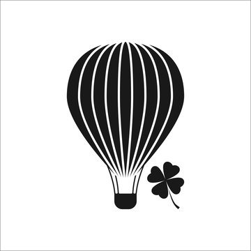 Hot air balloon with lucky clover sign simple icon on background