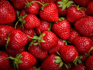 Strawberry background.  Red ripe organic strawberries on market