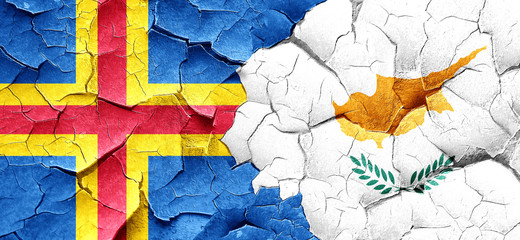 aland islands with Cyprus flag on a grunge cracked wall
