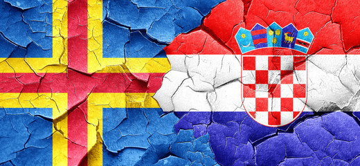 aland islands with Croatia flag on a grunge cracked wall