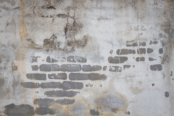concrete wall with texture of bricks and grunge background