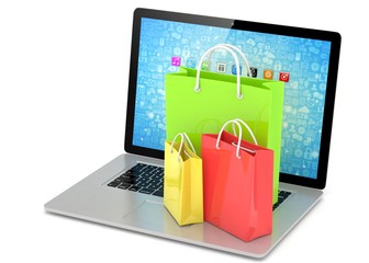 laptop and  shopping pags on white background. 3d rendering.