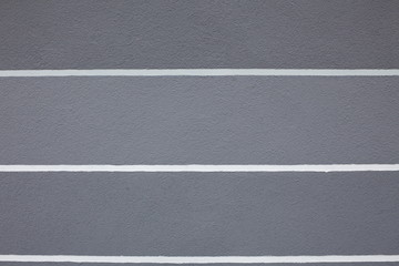 Fototapeta premium Ein hausputz mit weißen Linien auf frauem Hintergrunf