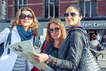 Fototapeta premium Three female tourists