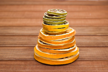 dried citrus on wooden background