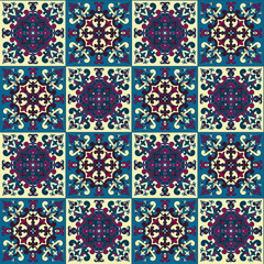 Hand drawing seamless pattern for tile in in dark blue, purple and yellow colors.