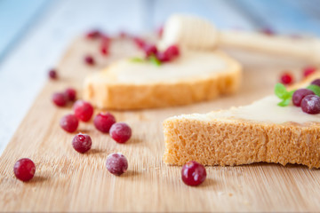 Sandwiches with cream honey and cranberries
