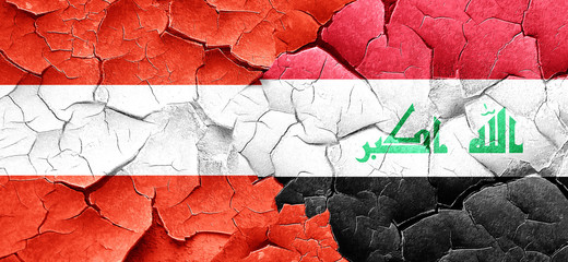 Austria flag with Iraq flag on a grunge cracked wall