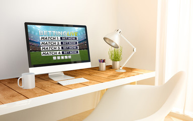 minimalist workplace with live betting computer