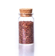  organic red rice in transparent glass bottle 