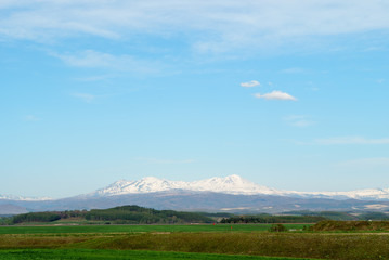 daisetuzan seen from Asahikawa Airport , Blue sky , with copy sp