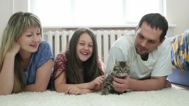 people and a small kitten