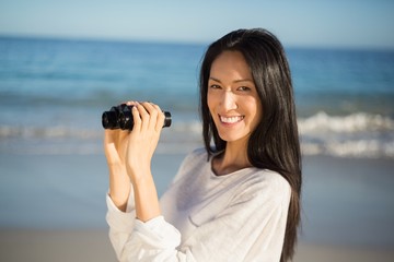 Woman holding binoculars