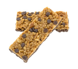 Two chocolate chip with peanuts protein bars isolated on a white background.