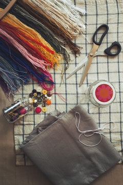 Directly above shot of sewing tools on table