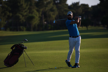 golfer hitting long shot