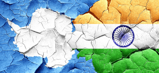 antarctica flag with India flag on a grunge cracked wall