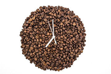 Clock of coffee grains isolated on white background. Clock pointed at seven o'clock
