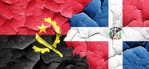 Angola flag with Dominican Republic flag on a grunge cracked wal