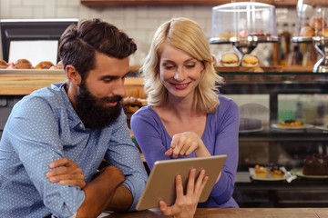Couple using a tablet computer