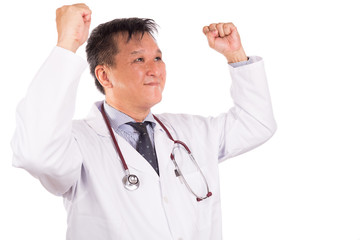 Successful matured Asian medical doctor rejoicing with raised hands