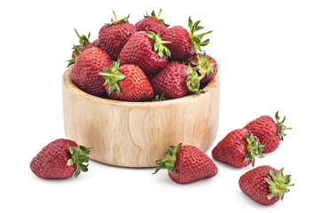 Fresh raw organic strawberries in wooden bowl on a white background