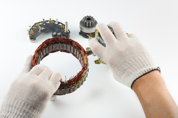 The electrical part of the generator in the hand