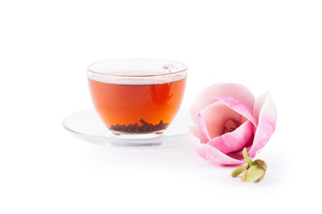Cup of tea with pair pink magnolia