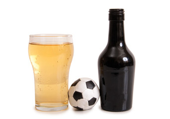 Glass beer mug and a ball on a white background
