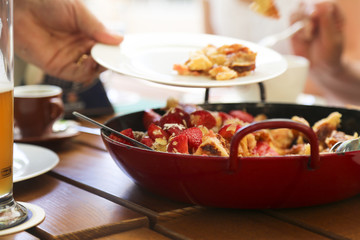 Pancake dessert with almond and strawberries