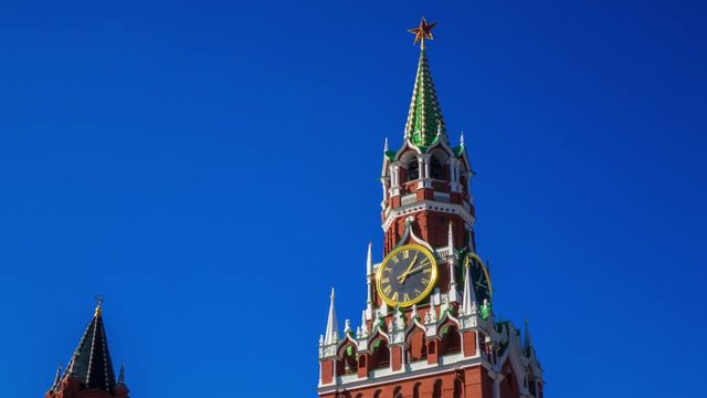 Time lapse of Moscow Kremlin (Russia) tower clock against blue sky