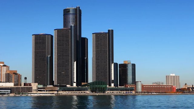 A Timelapse of the Detroit skyline with freighter crossing in front