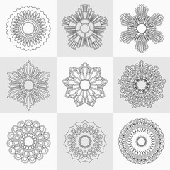 Set of decorative design elements isolated on grey background.  Flowers, snowflakes, abstract floral pattern, star, sun. Vector logo,  sign, stick figures. Floral ornament. Coloring Design template